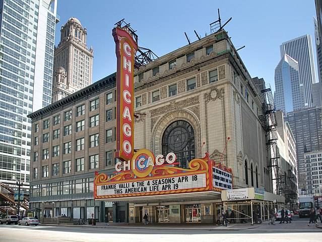Image of the Chicago Theater with the city in the background